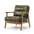 Sillón de cuero con estructura de madera de nogal