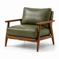 Sillón de cuero PU verde con estructura de nogal