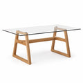 Mesa de comedor de madera y vidrio templado